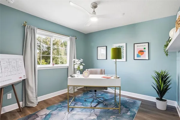 a workspace with furniture and window