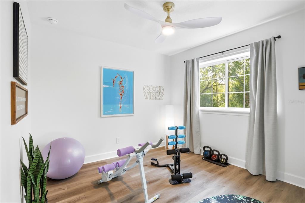 1012 Farmstead Street Eustis, FL 32736 - Photo 23 of 28 a living room with furniture and a window