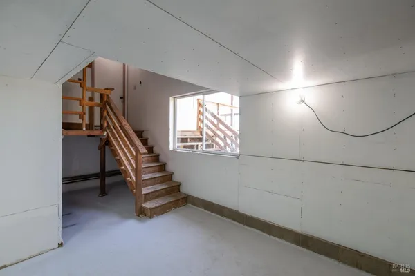 a view of an entryway with stairs