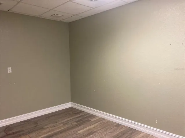 a view of small space with wooden floor