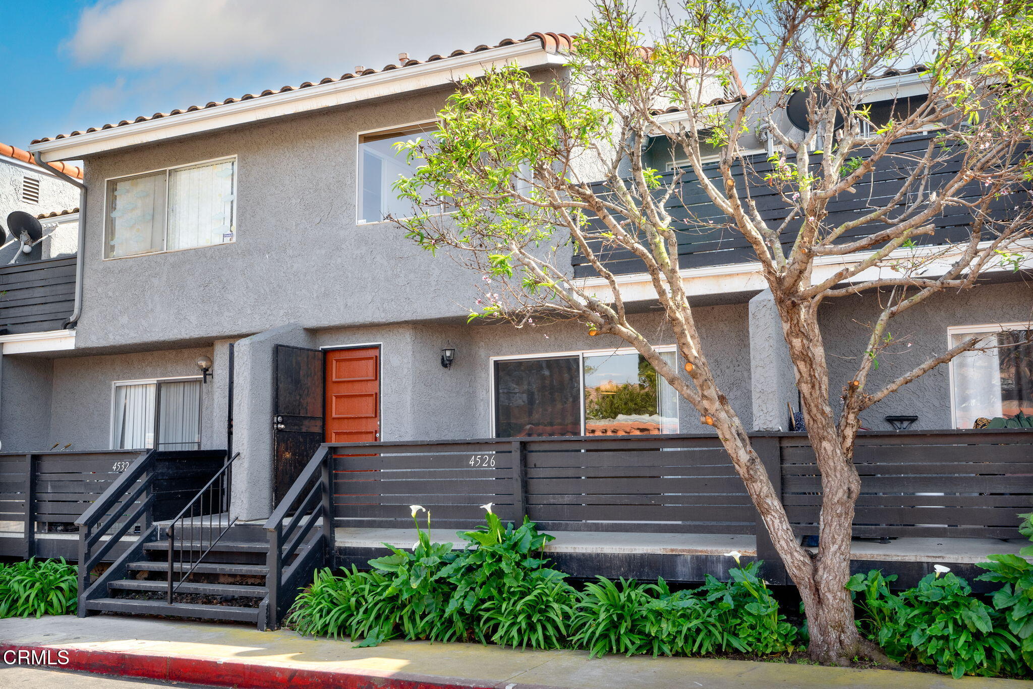 4526 Saviers Road Oxnard, CA 93033 - Photo 1 of 20 a front view of a house with garden