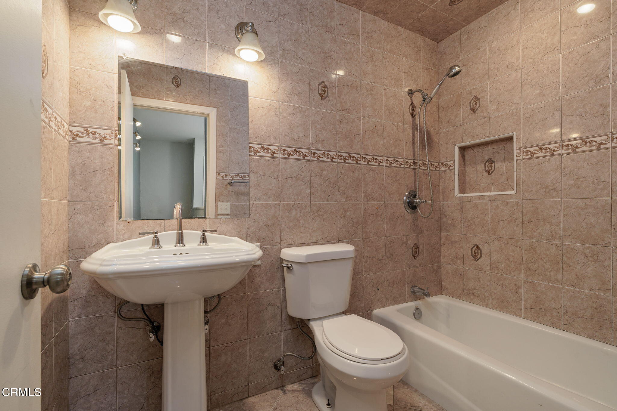 4526 Saviers Road Oxnard, CA 93033 - Photo 11 of 20 a bathroom with a sink toilet and shower