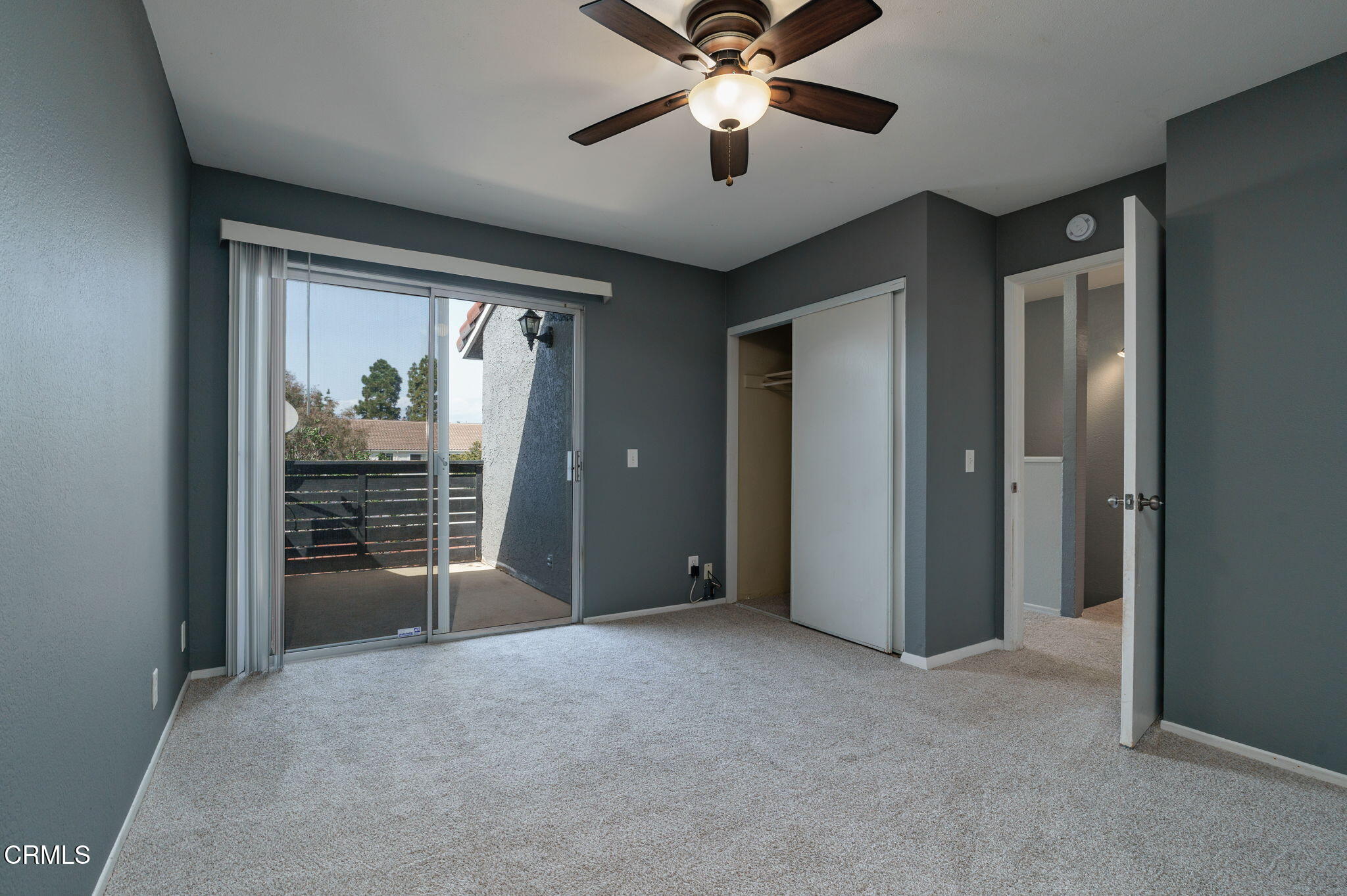 4526 Saviers Road Oxnard, CA 93033 - Photo 13 of 20 a view of empty room with wooden floor and fan