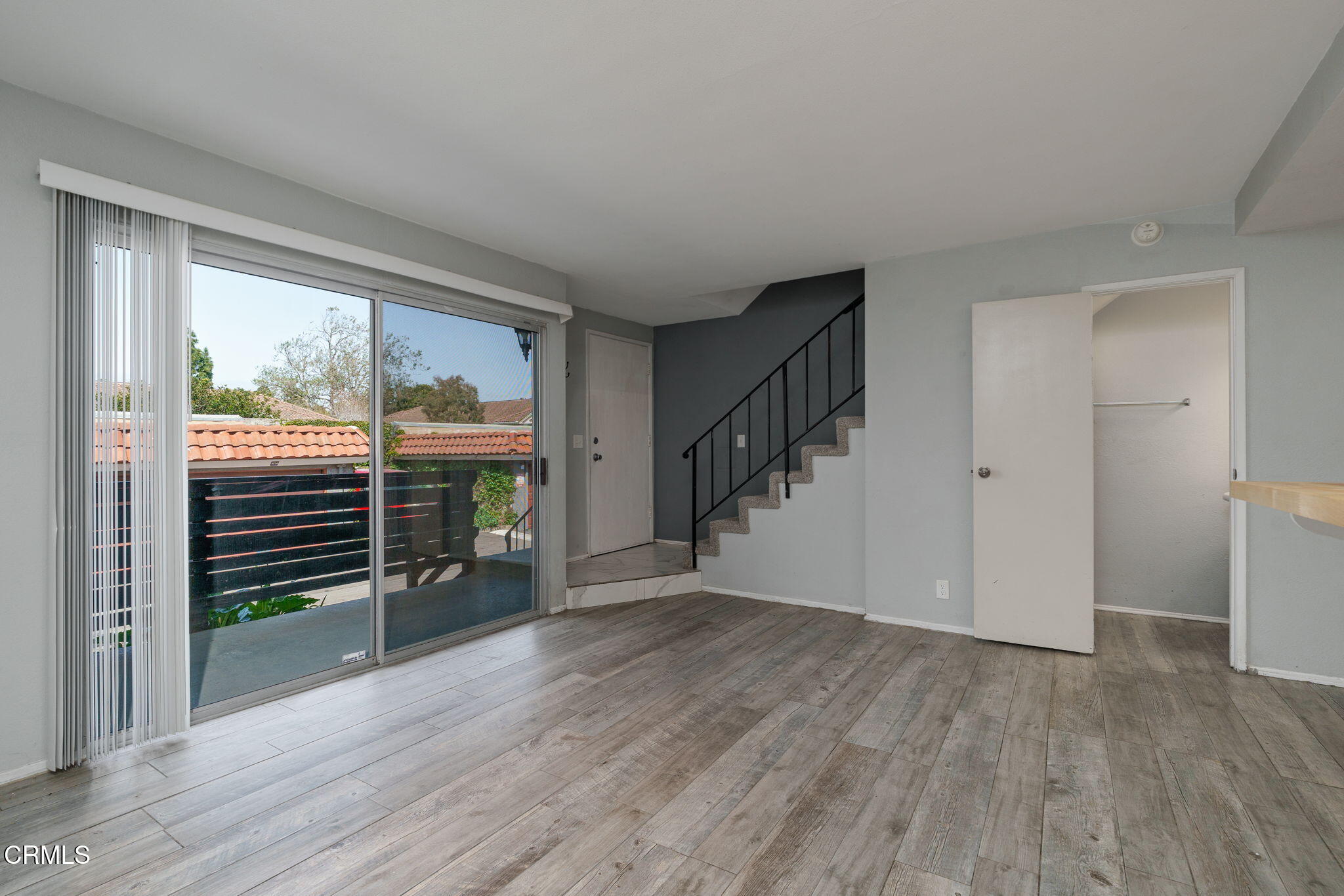 4526 Saviers Road Oxnard, CA 93033 - Photo 7 of 20 a view of empty room with wooden floor and fan