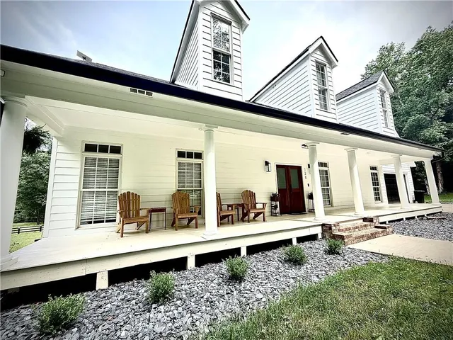 a house view with outdoor seating space