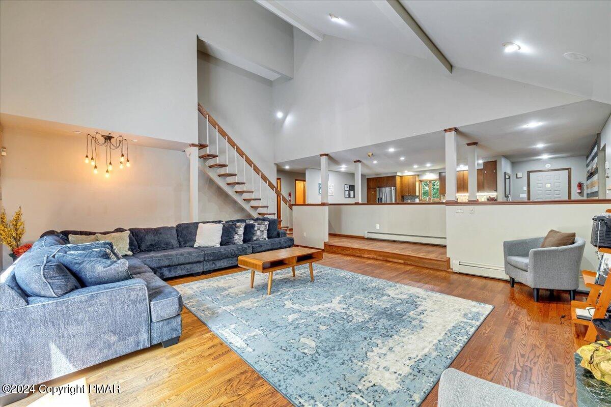 401 Minsi Trail West Long Pond, PA 18334 - Photo 13 of 34 a living room with furniture and wooden floor