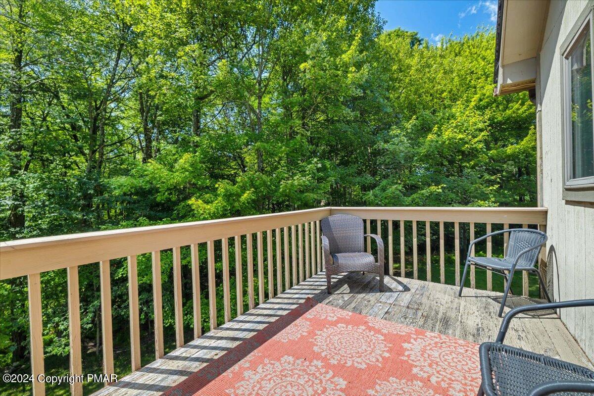 401 Minsi Trail West Long Pond, PA 18334 - Photo 22 of 34 a view of a two chairs in the deck
