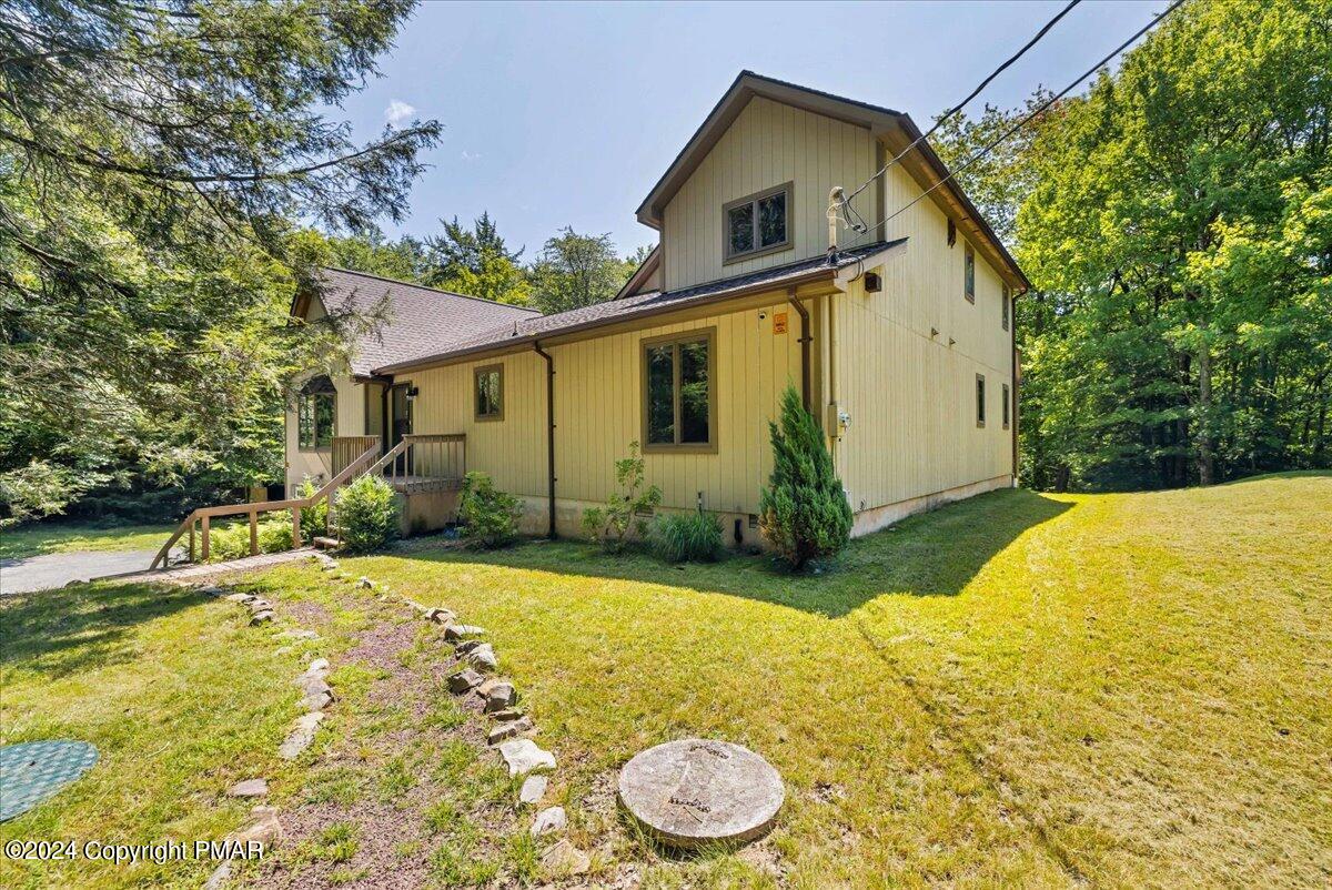 401 Minsi Trail West Long Pond, PA 18334 - Photo 34 of 34 a view of a house with a backyard