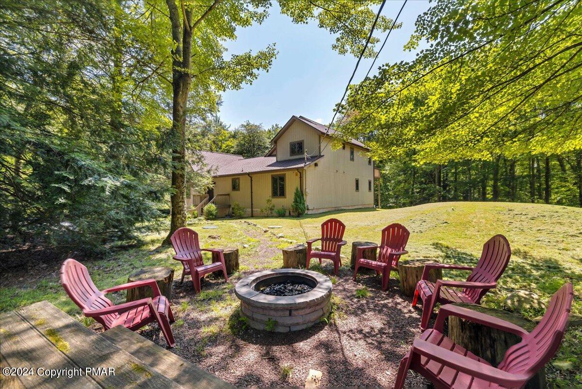 401 Minsi Trail West Long Pond, PA 18334 - Photo 5 of 34 a view of a patio with couple of chairs