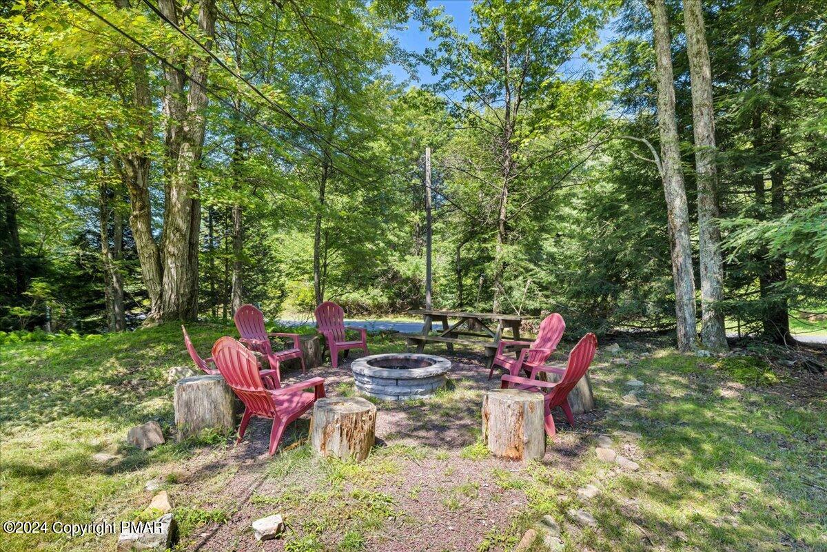 401 Minsi Trail West Long Pond, PA 18334 - Photo 6 of 34 a view of a chairs in a backyard