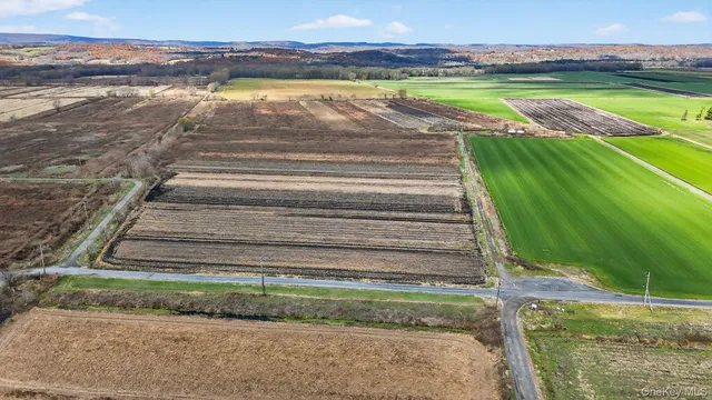 swimming pool view with a sitting space