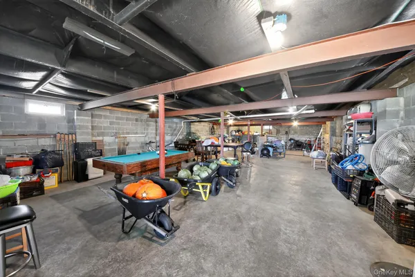 a view of a garage with a table and chairs