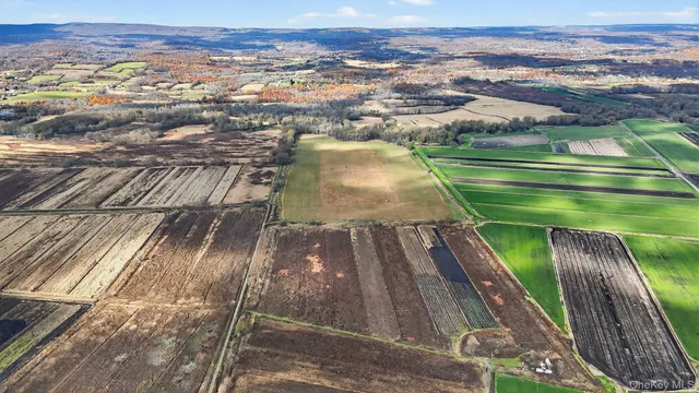 a view of swimming pool with a yard and outdoor seating