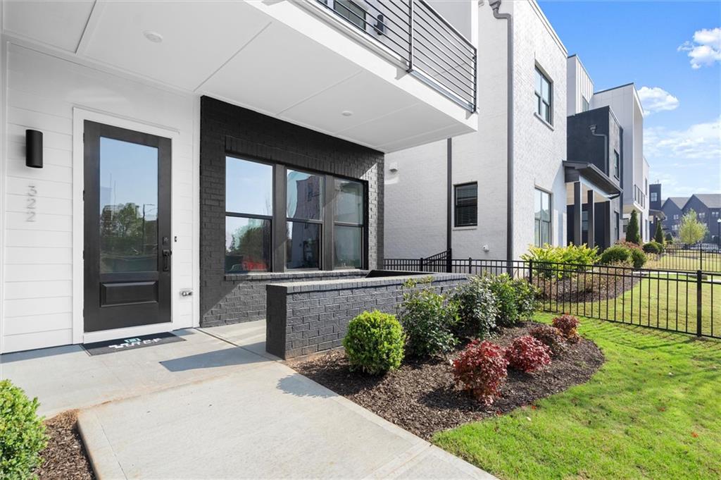 322 Treble Way Alpharetta, GA 30009 - Photo 3 of 67 a house view with a outdoor space
