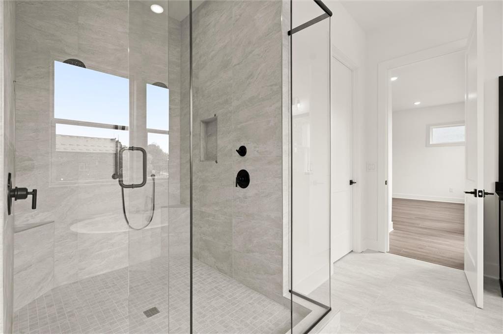 322 Treble Way Alpharetta, GA 30009 - Photo 34 of 67 a bathroom with a shower