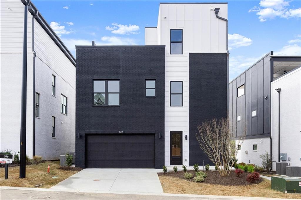 322 Treble Way Alpharetta, GA 30009 - Photo 52 of 67 a front view of a building with a outdoor space