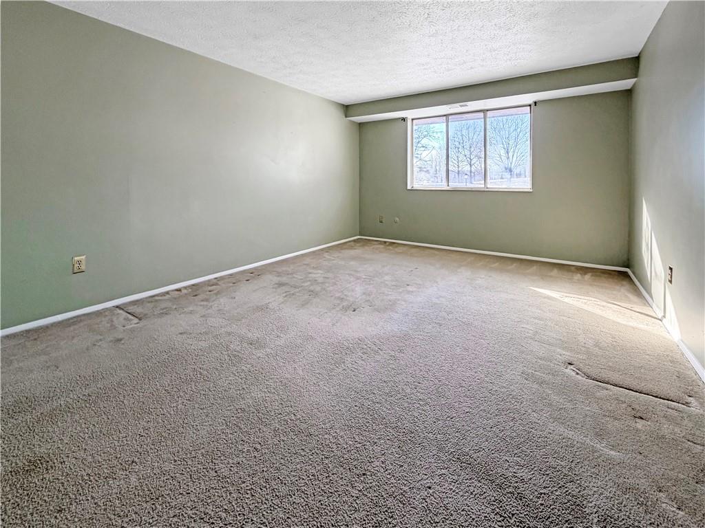 2467 Brook Ledge Road, Unit 34B Bridgeville, PA 15017 - Photo 11 of 19 an empty room with windows