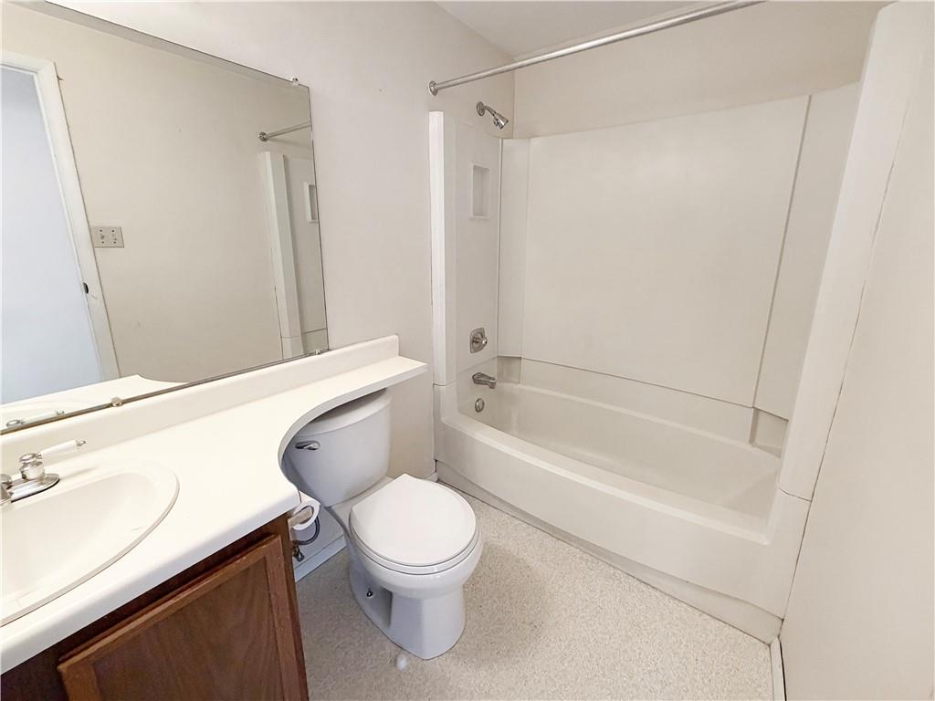 2467 Brook Ledge Road, Unit 34B Bridgeville, PA 15017 - Photo 15 of 19 a bathroom with a sink a toilet and shower