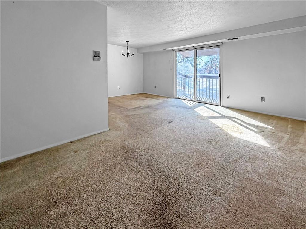 2467 Brook Ledge Road, Unit 34B Bridgeville, PA 15017 - Photo 4 of 19 an empty room with windows