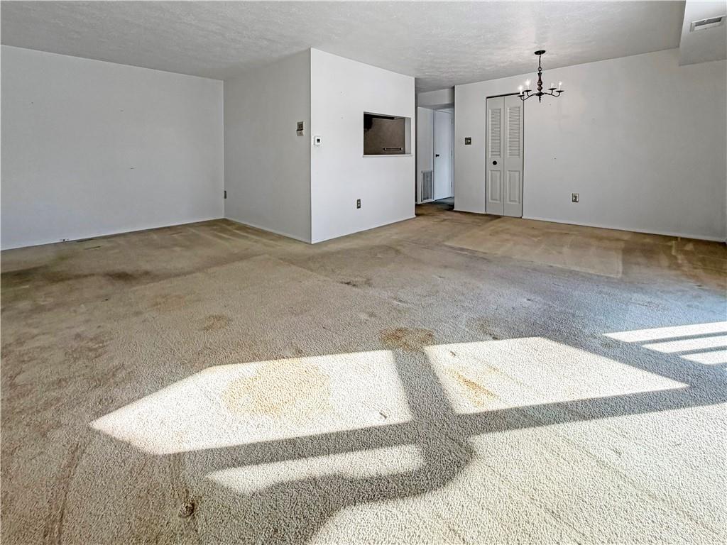2467 Brook Ledge Road, Unit 34B Bridgeville, PA 15017 - Photo 5 of 19 a view of a livingroom with wooden floor