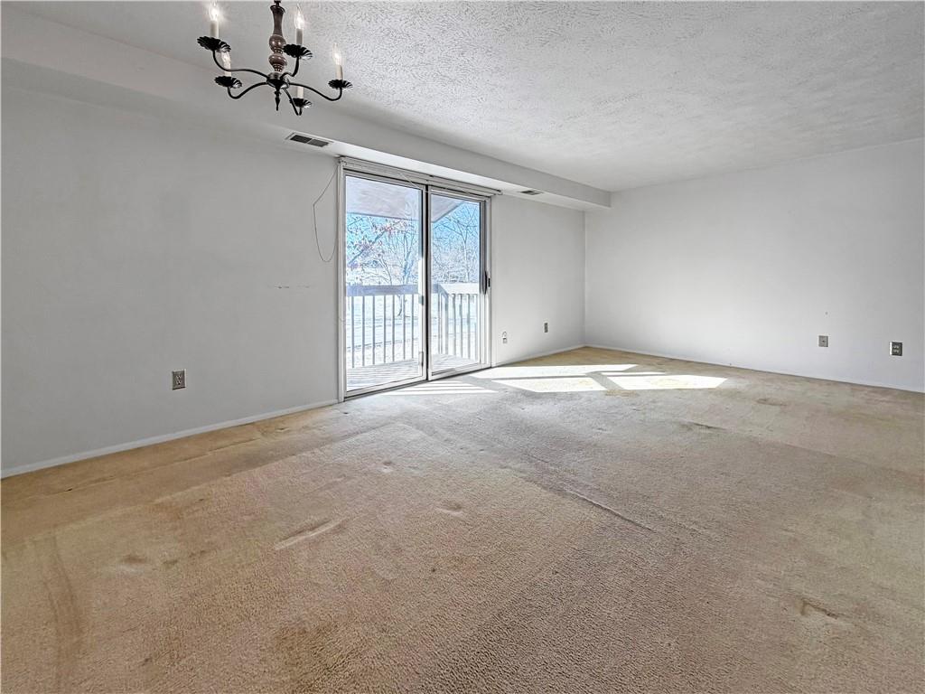 2467 Brook Ledge Road, Unit 34B Bridgeville, PA 15017 - Photo 6 of 19 a view of an empty room with a window