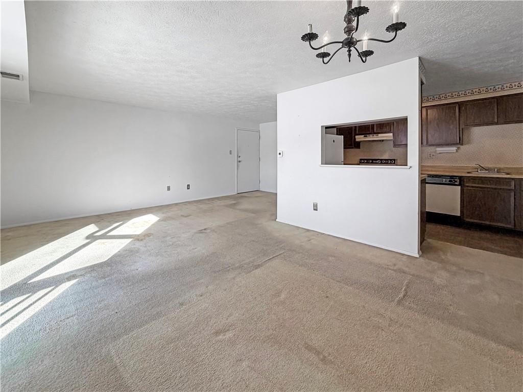 2467 Brook Ledge Road, Unit 34B Bridgeville, PA 15017 - Photo 7 of 19 a view of a kitchen with a sink and dishwasher