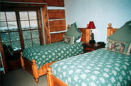 8 Altamira Ranch Road Basalt, CO 81621 - Photo 7 of 8 a bed room with a bed and a window