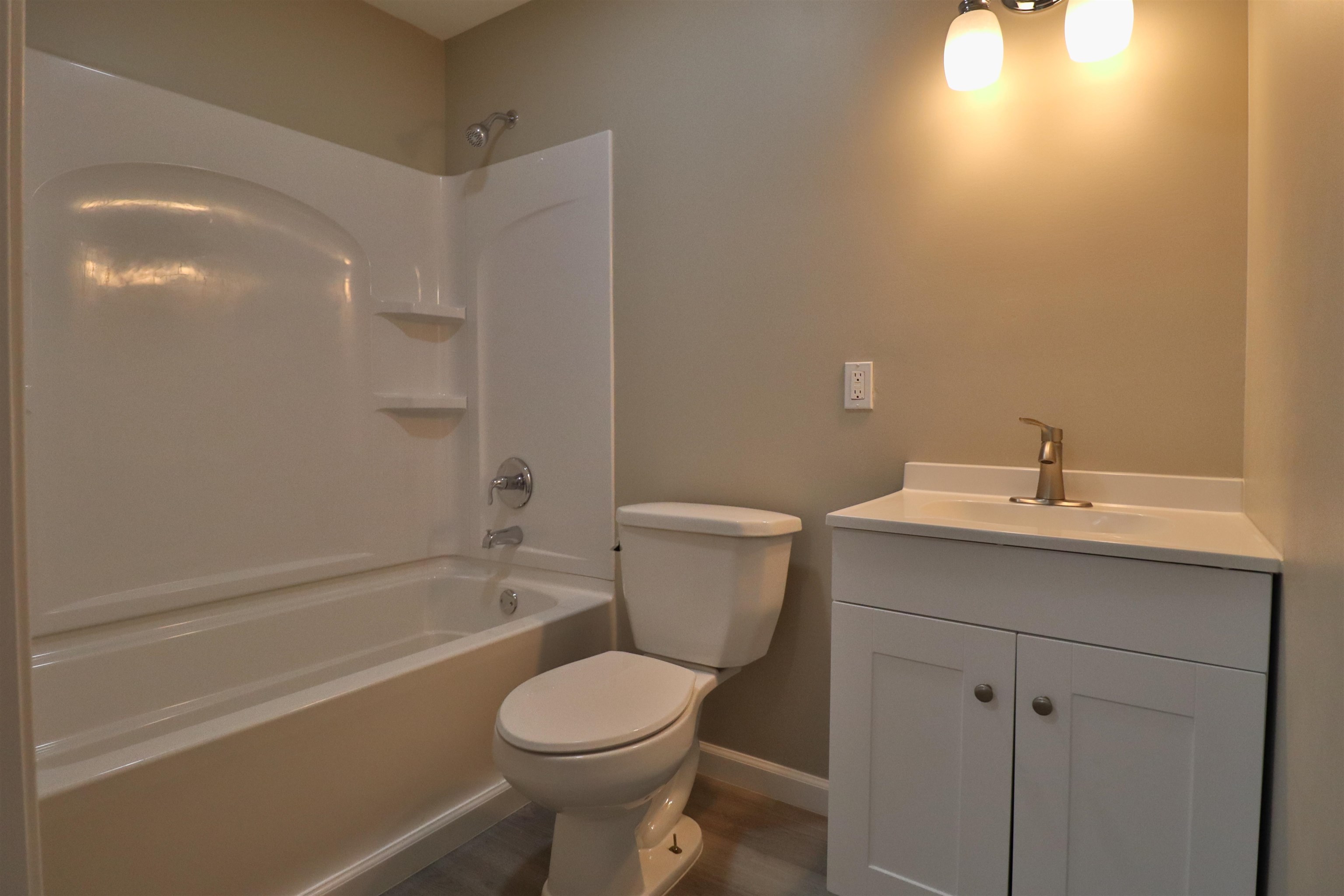 224 Kellar Avenue Ripley, TN 38063 - Photo 19 of 30 a bathroom with a sink toilet and shower
