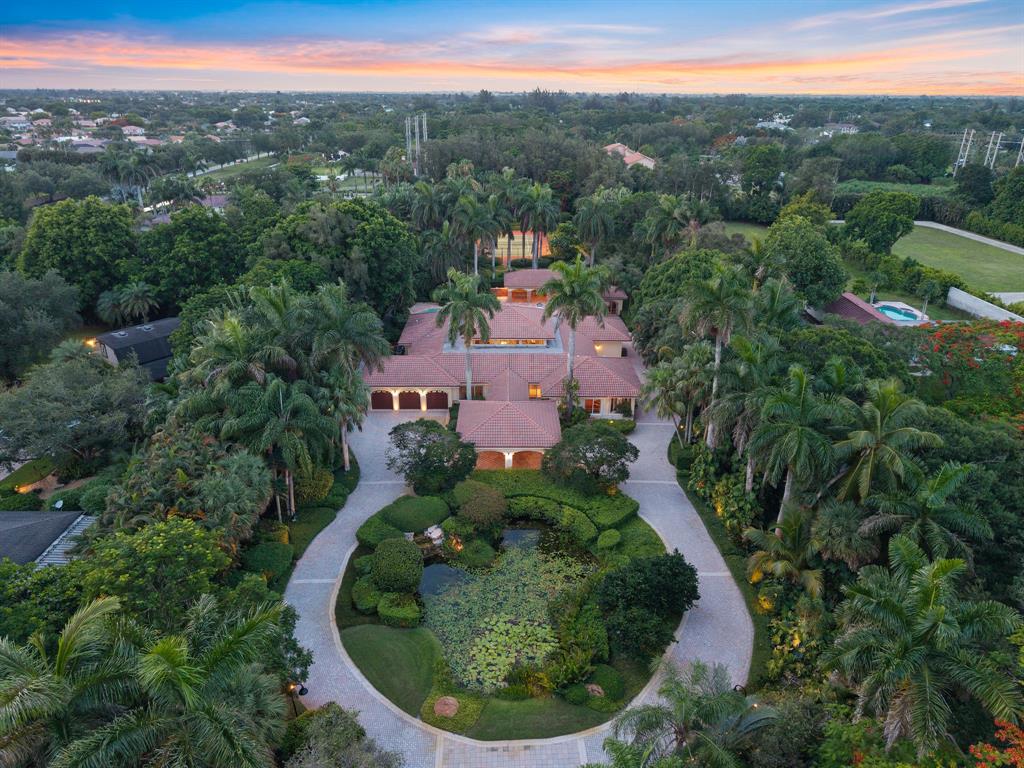 an aerial view of a house with a garden