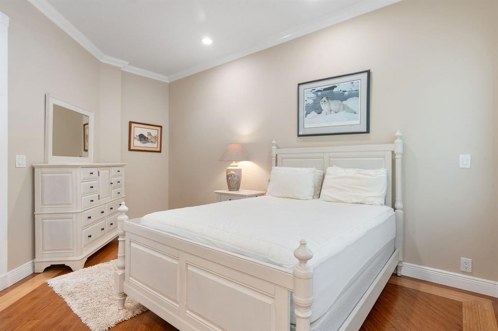 14641 Mustang Trail Southwest Ranches, FL 33330 - Photo 56 of 94 a bedroom with a bed and a lamp on dresser