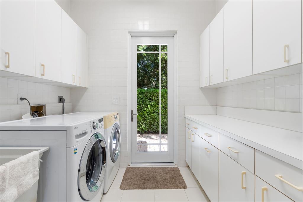 14641 Mustang Trail Southwest Ranches, FL 33330 - Photo 61 of 94 a utility room with dryer and washer