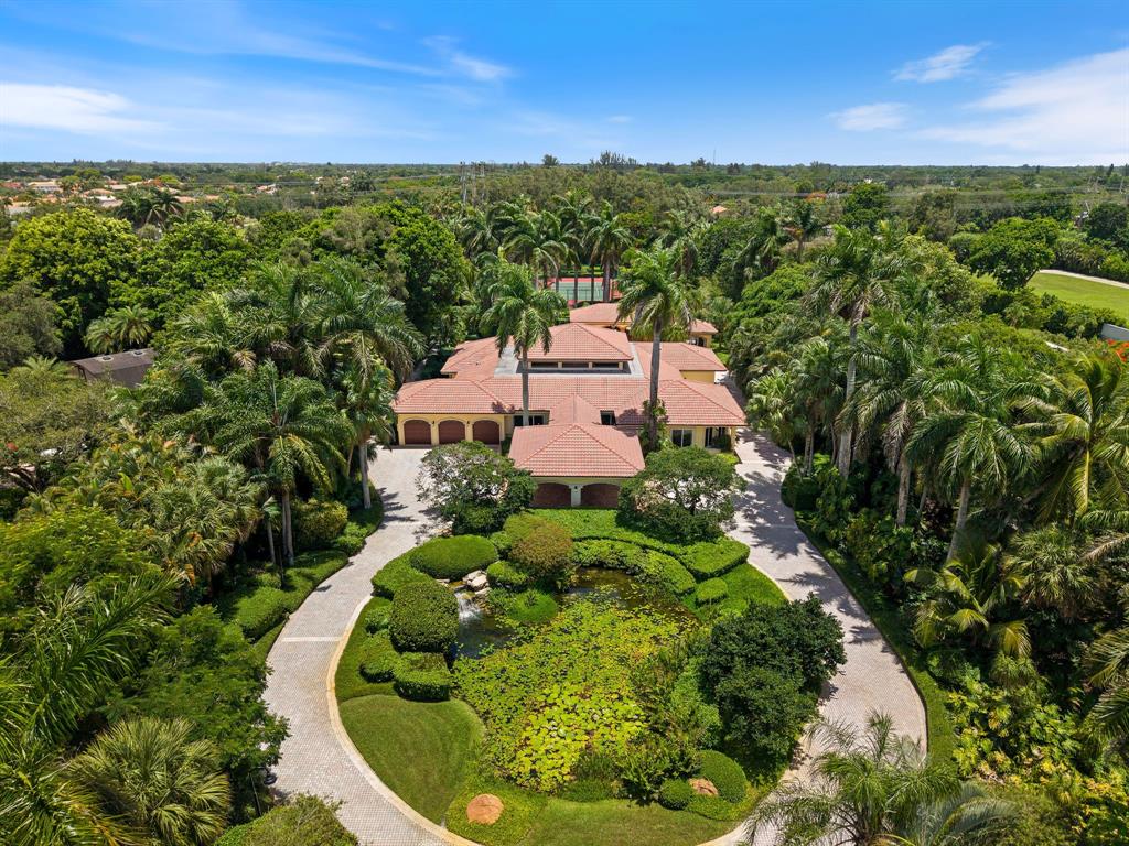 14641 Mustang Trail Southwest Ranches, FL 33330 - Photo 8 of 94 an aerial view of a house with a garden