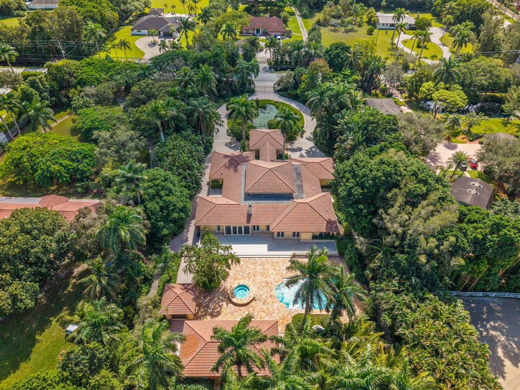 14641 Mustang Trail Southwest Ranches, FL 33330 - Photo 81 of 94 an aerial view of a house with a garden