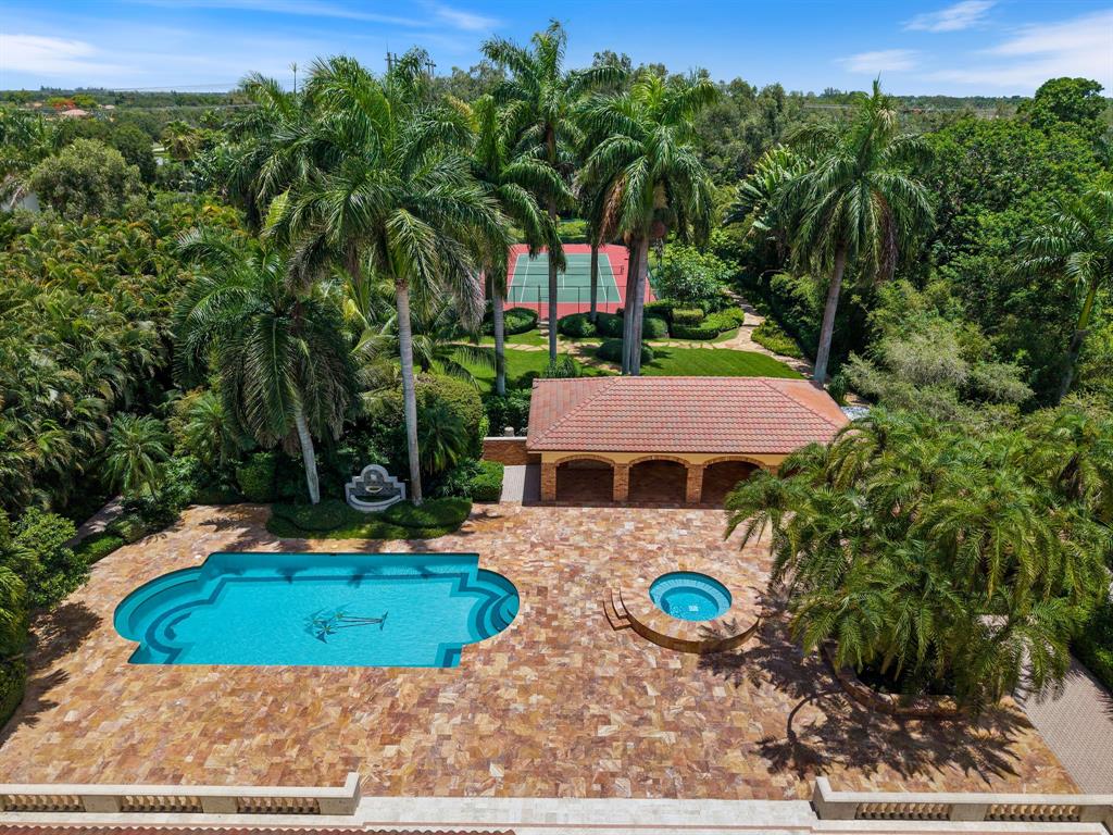 14641 Mustang Trail Southwest Ranches, FL 33330 - Photo 9 of 94 an aerial view of a house with swimming pool and yard