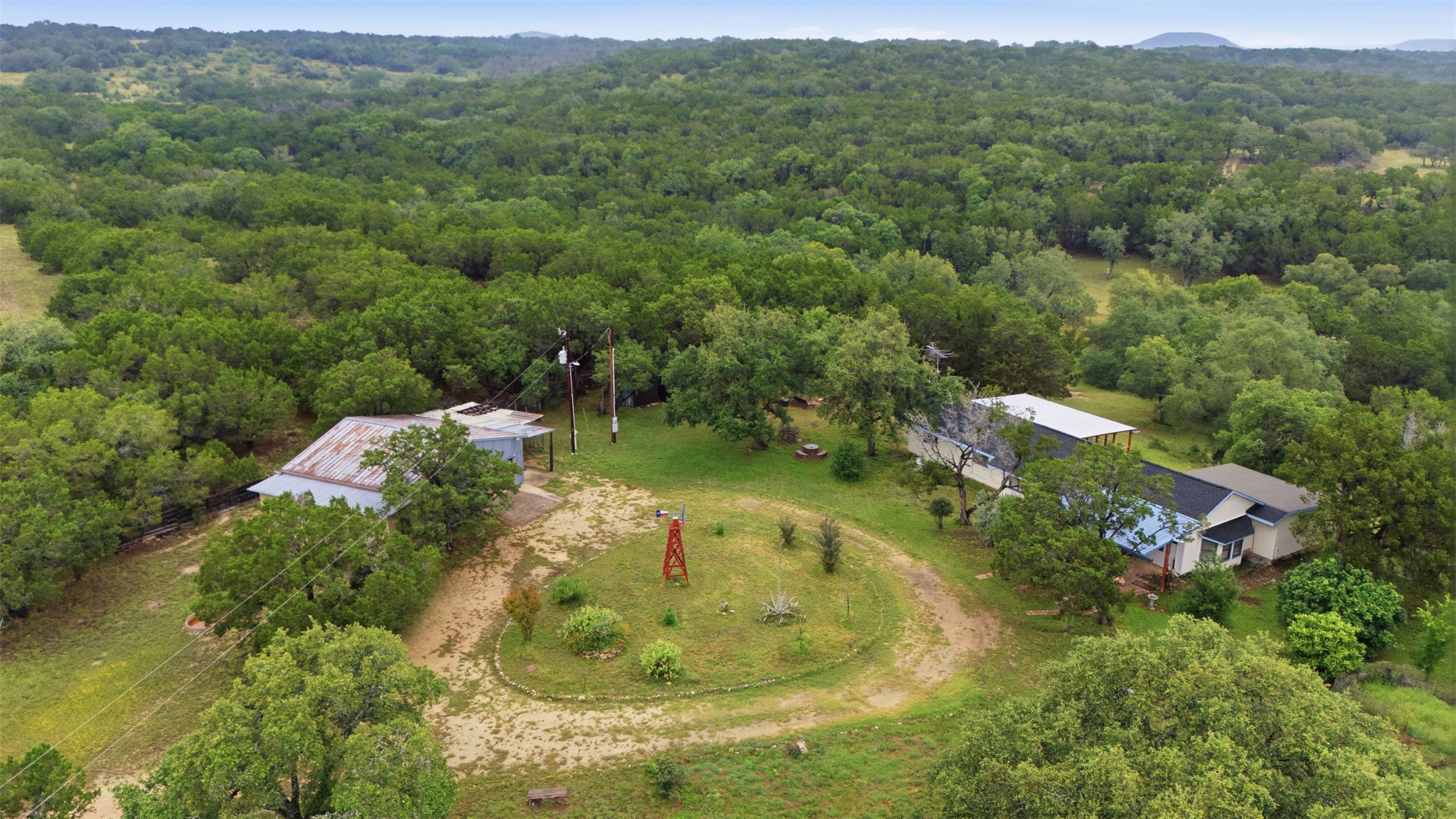 27600 Ranch To Market 1431 Marble Falls, TX 78654 - Photo 1 of 33 5 Beautiful Gated and Fenced Hillcountry Acres with NO RESTRICTIONS