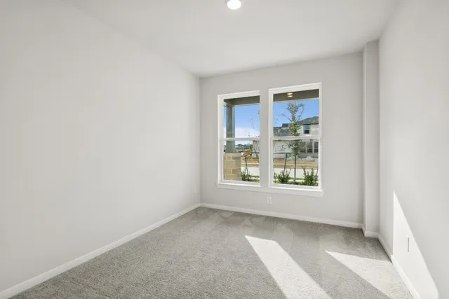 a bathroom with a double vanity sink a mirror and shower