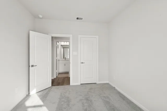 a bathroom with a sink vanity and a mirror