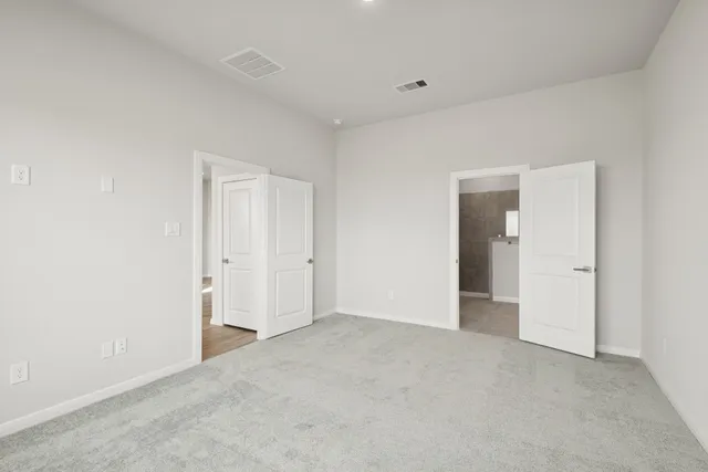 a bathroom with a sink vanity granite and a mirror