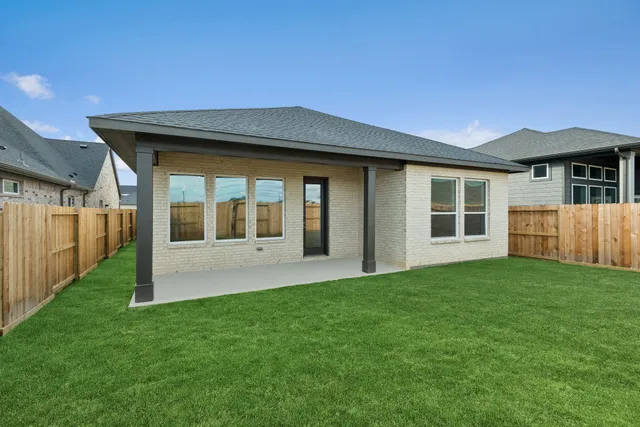 a view of hallway with wooden floor