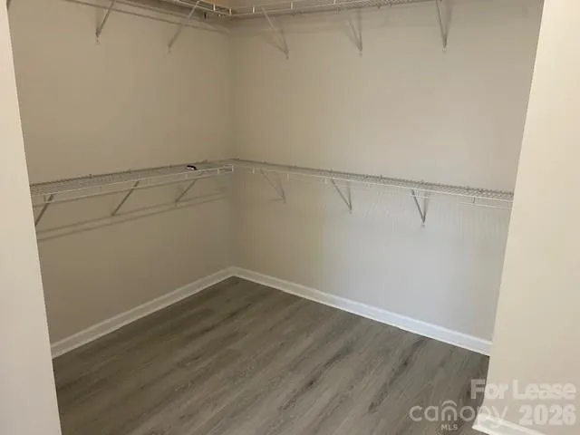 a view of a room with racks on the wall