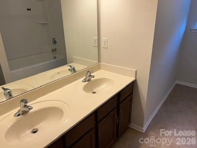 a bathroom with a bathtub