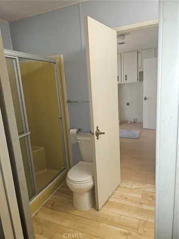 an empty room with closet area