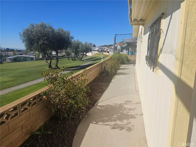 a view of a pathway both side of building