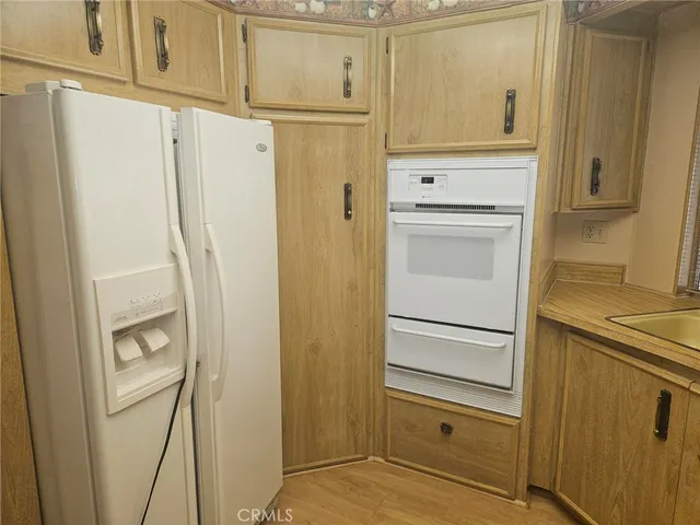 a view of hallway with windows