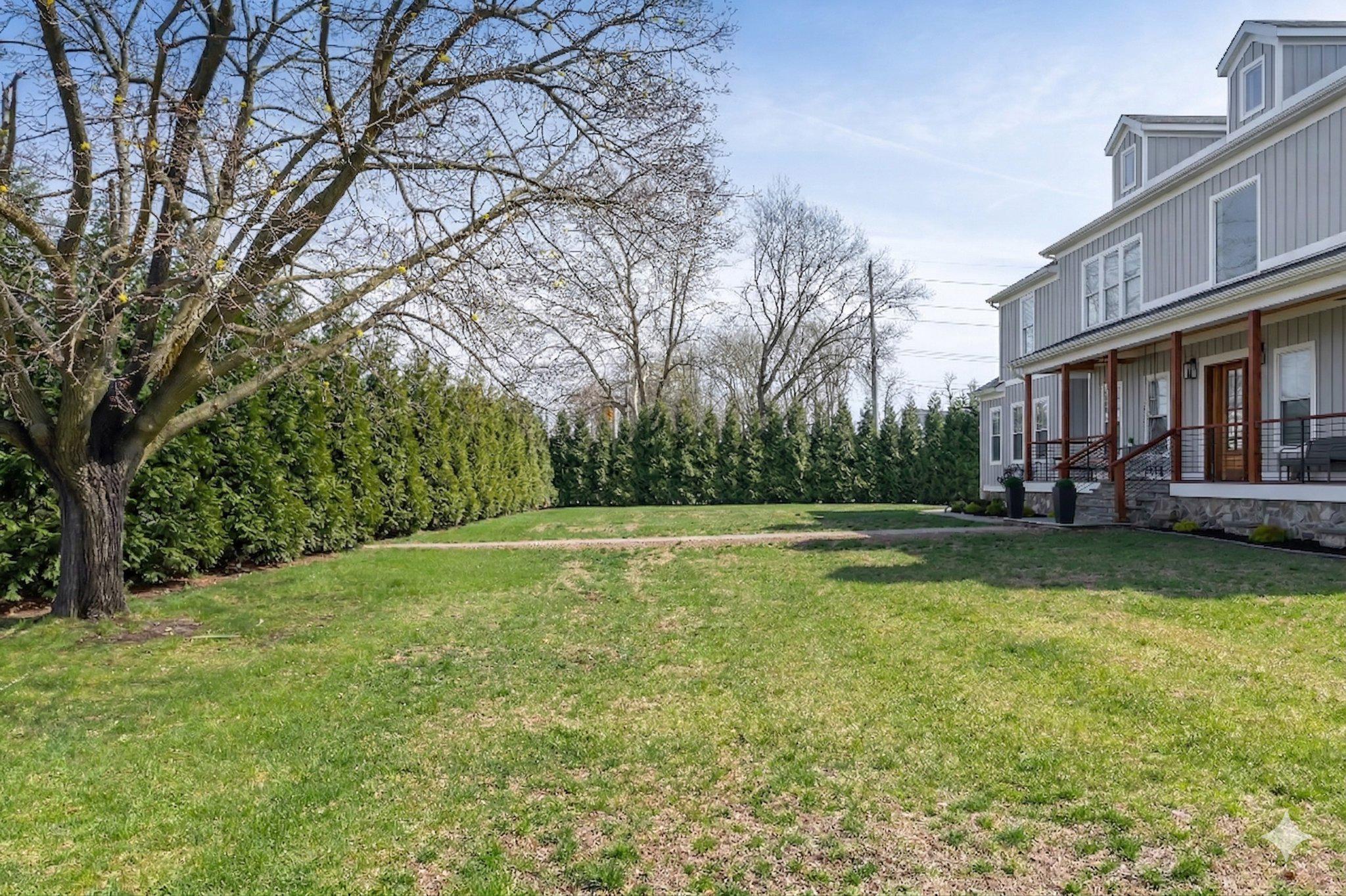 144 Hurffville Grenloch Road Sewell, NJ 08080 - Photo 12 of 50 a view of a swimming pool and a yard