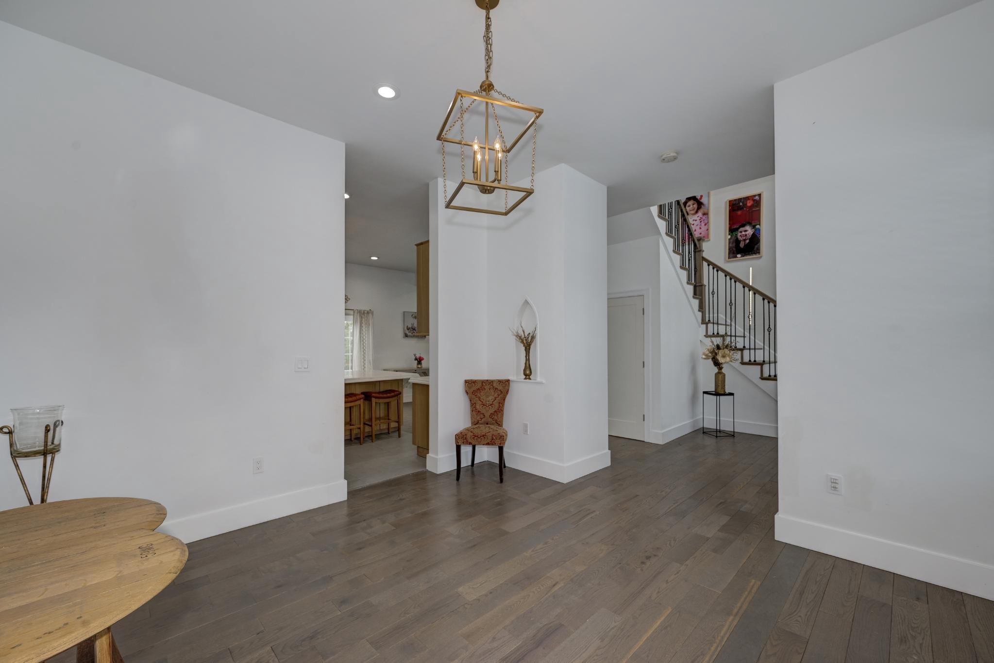 144 Hurffville Grenloch Road Sewell, NJ 08080 - Photo 16 of 50 a view of a livingroom and a kitchen with wooden floor