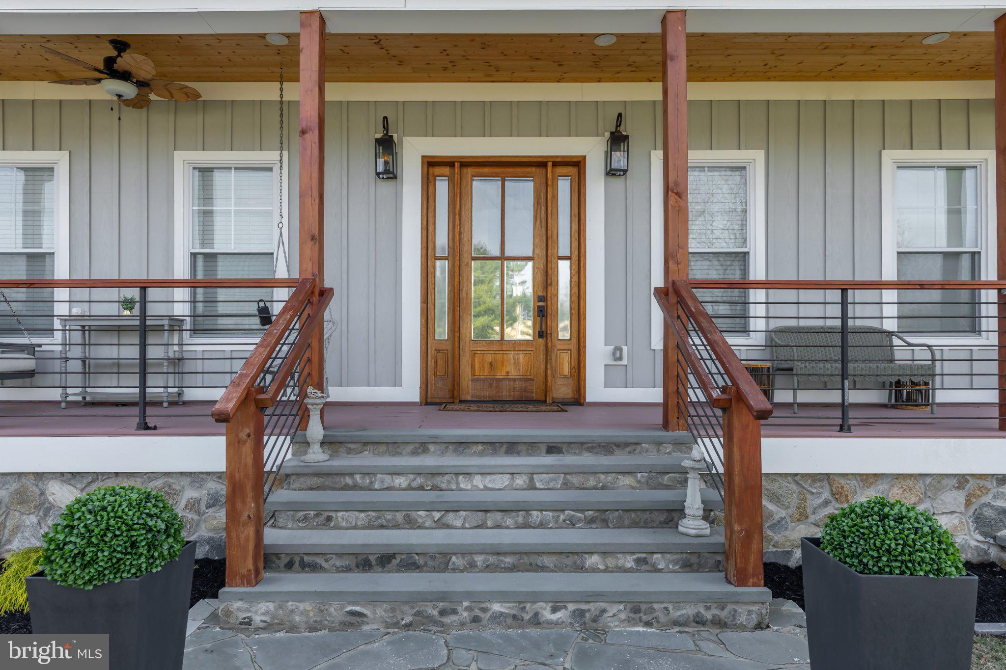 144 Hurffville Grenloch Road Sewell, NJ 08080 - Photo 2 of 50 a front view of a house with potted plants