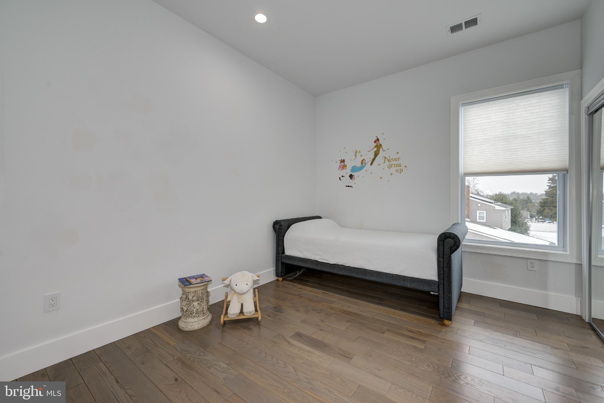 144 Hurffville Grenloch Road Sewell, NJ 08080 - Photo 40 of 50 a bedroom with a bed and a window