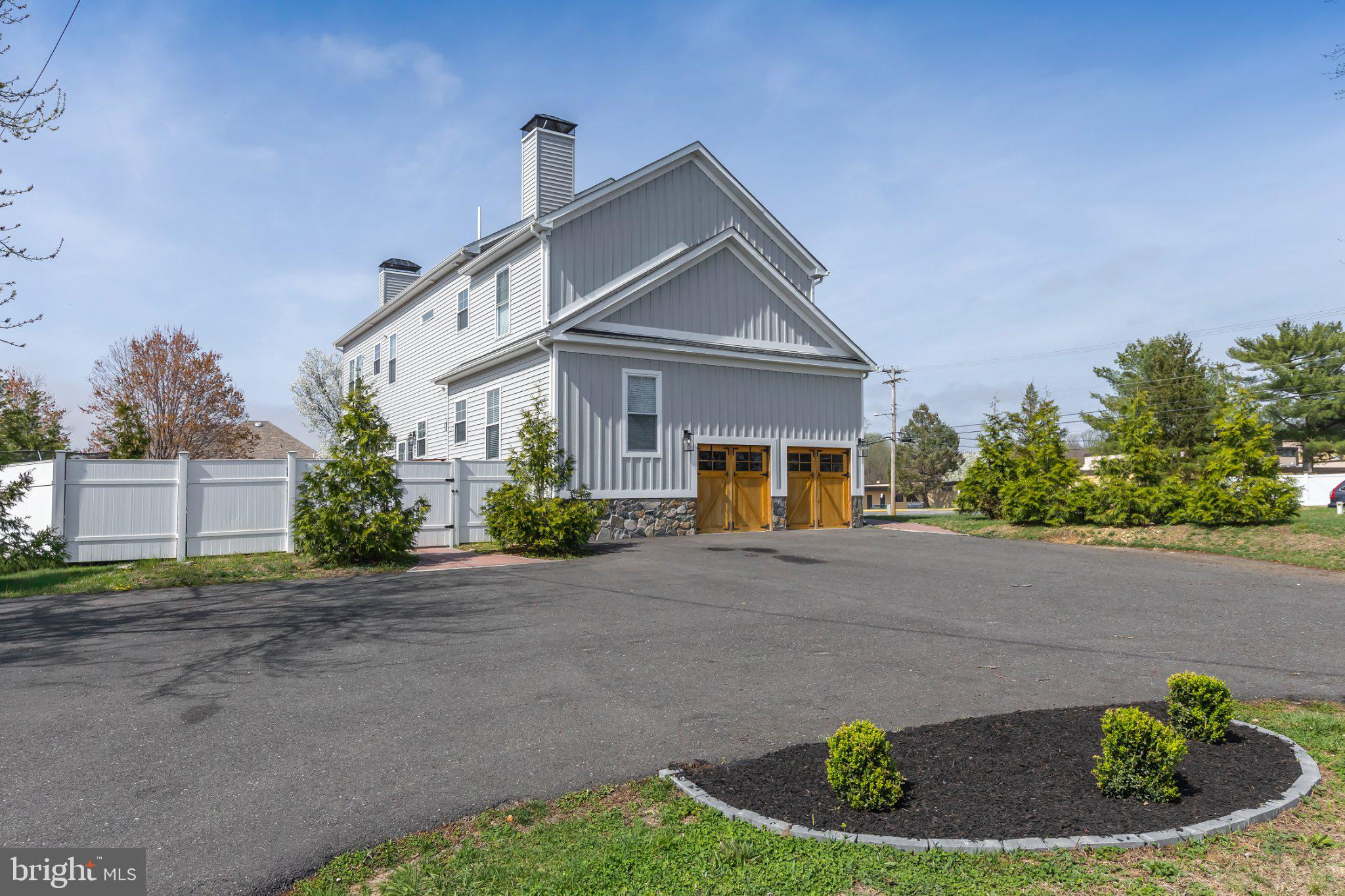 144 Hurffville Grenloch Road Sewell, NJ 08080 - Photo 8 of 50 a front view of a house with a yard and garage