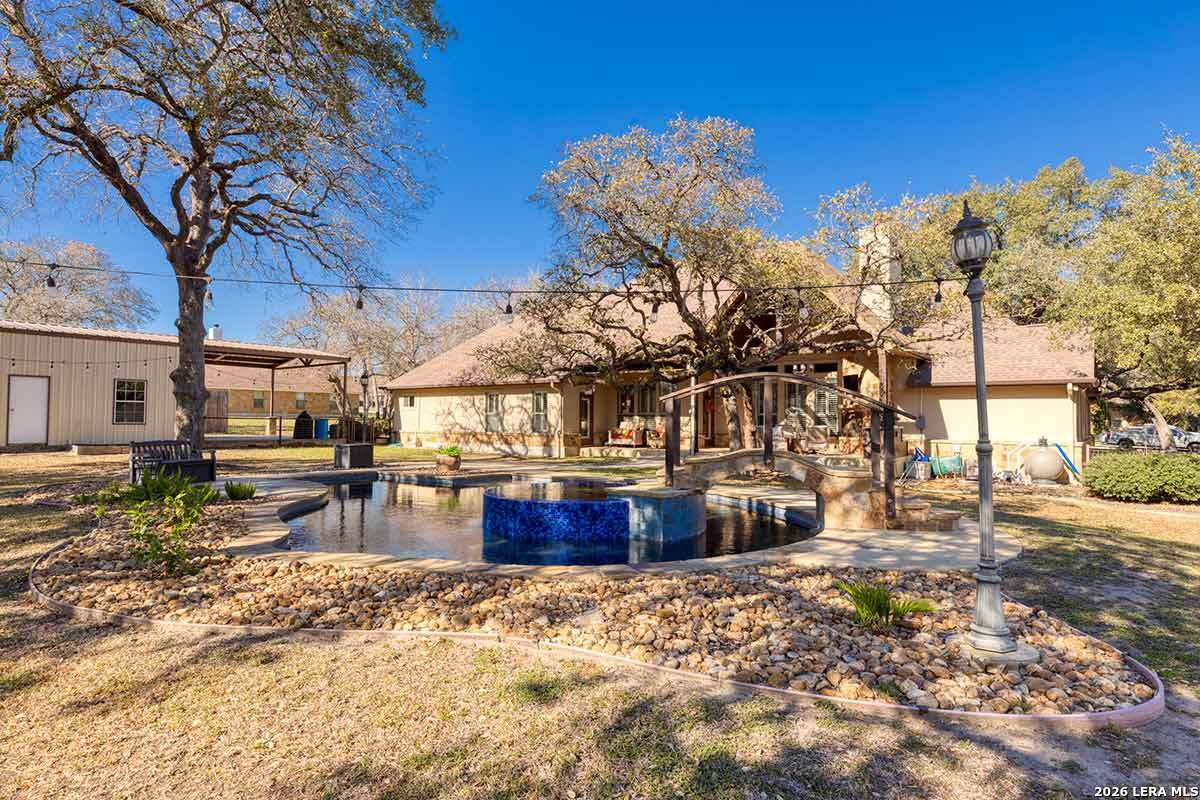 148 Copper Ridge Drive La Vernia, TX 78121 - Photo 2 of 42 a view of a large yard